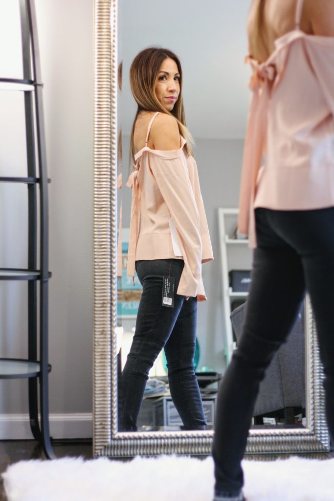 DAILYLOOK BOX REVIEW: SPRING FASHION featured by top New Jersey fashion blog, House of Leo: image of a woman trying on her new outfits from her Dailylook box