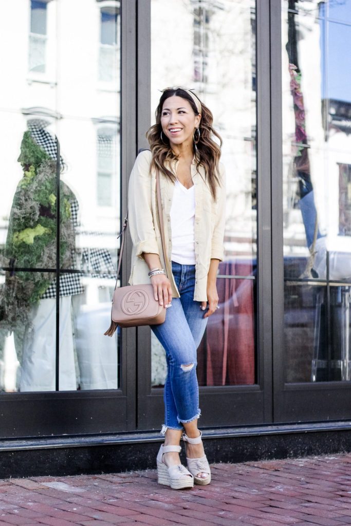 Spring Finds at Express by top US fashion blog, House of Leo Blog: image of woman wearing yellow button down, distressed cropped jeans from Express and Marc Fisher Anty espadrilles
