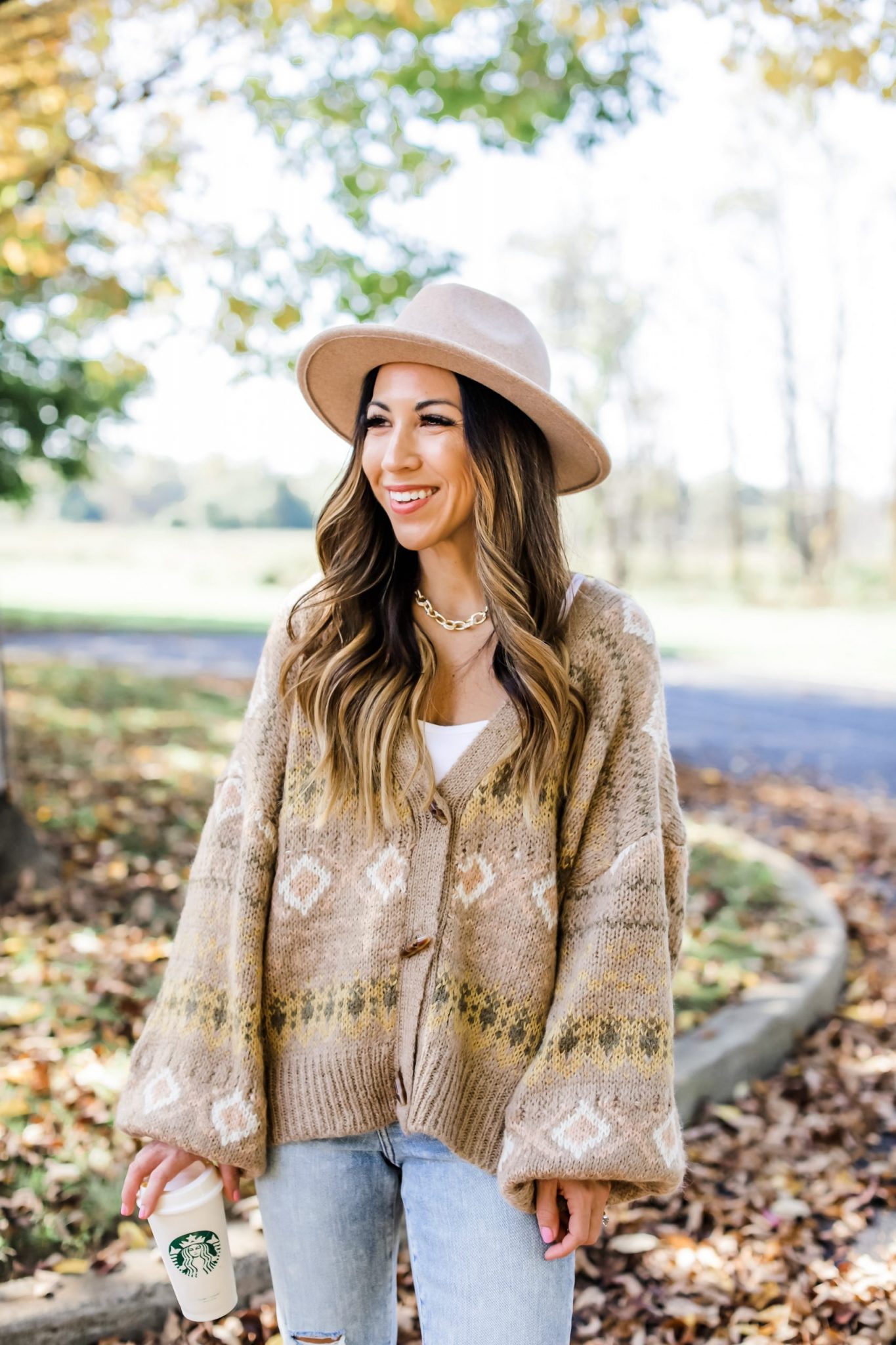 March Favorites From Express by top US fashion blog, House of Leo Blog: March favorites from Express, image of white eyelet puff sleeve top