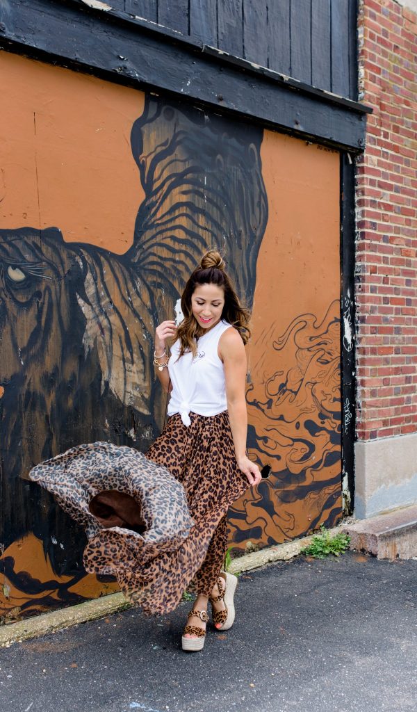 The Best Leopard Pieces for Summer by top US fashion blog, House of Leo Blog: image of woman wearing Chicwish leopard skirt, Mama tank, and Rex leopard espadrilles by Marc Fisher